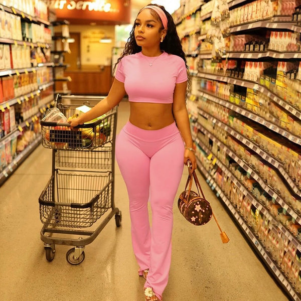 European and American  women's clothing 2024 autumn hot solid color round neck short-sleeved top tight casual trousers two-piece set