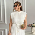 Ready-to-ship european and american export women's clothing,  spring/summer collection: fashionable and minimalist midi dress with mock neck, cinched waist, and tie detail