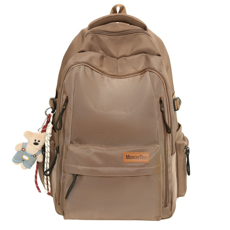 New high school students reduce the burden of backpacks, large-capacity student schoolbags, women's leisure travel, mountaineering backpacks, men's