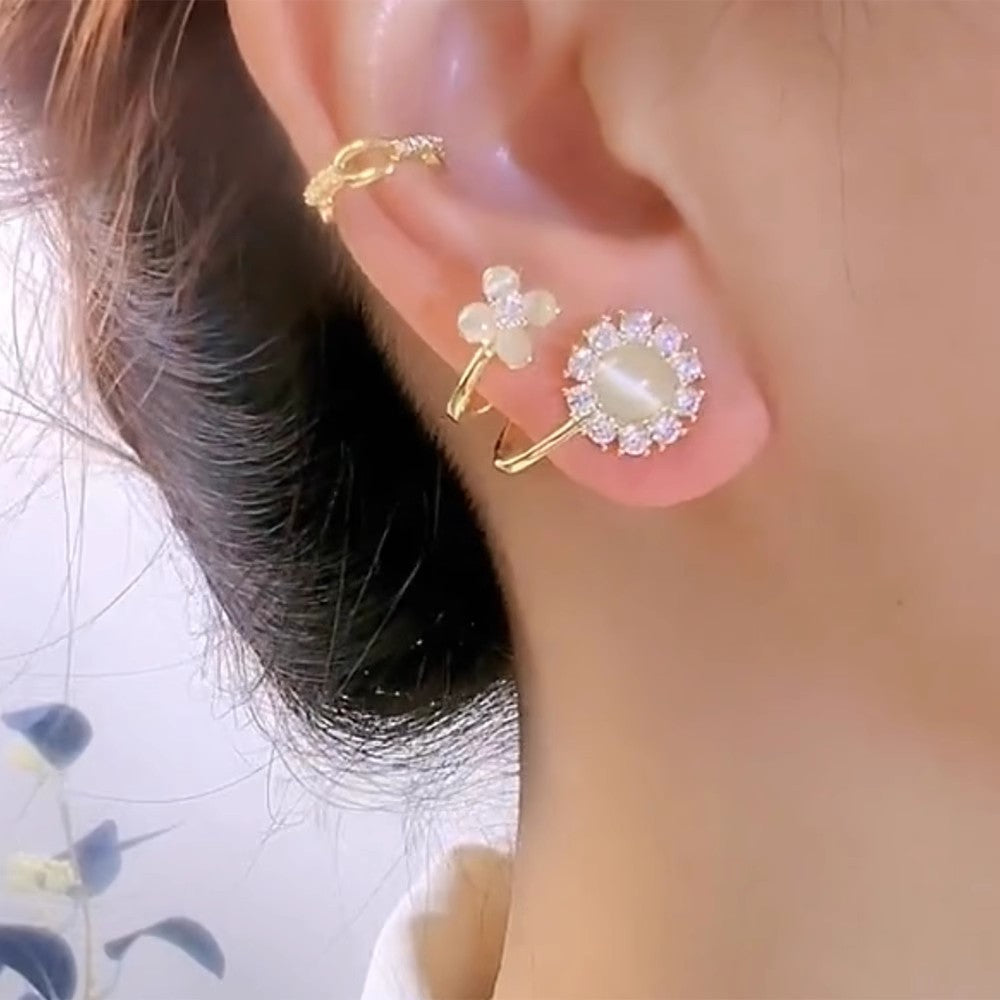 Luxury fashion floral earrings - unique studs, geometric ear cuffs, and accessories featuring geometric floral design details