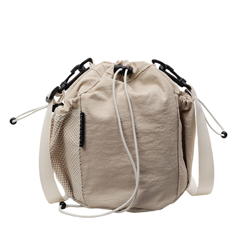 New drawstring bundle hand carry bucket bag  simple casual versatile shoulder bag outdoor commuter messenger women's bag