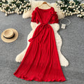 French-inspired pleated, waist-cinching, slimming dress for women. red, tie-waist, elegant, and flowy maxi dress, perfect for the office