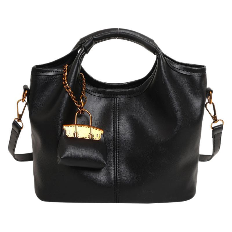 Retro niche handbag women's autumn and winter new high-end commuting large-capacity shoulder messenger bag mother and child bag