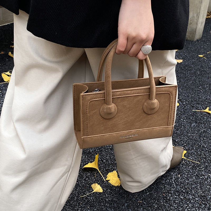 Handheld small bag for women, new arrival, high-end retro patchwork design, versatile and stylish shoulder bag with a premium feel, and a fashionable crossbody bag