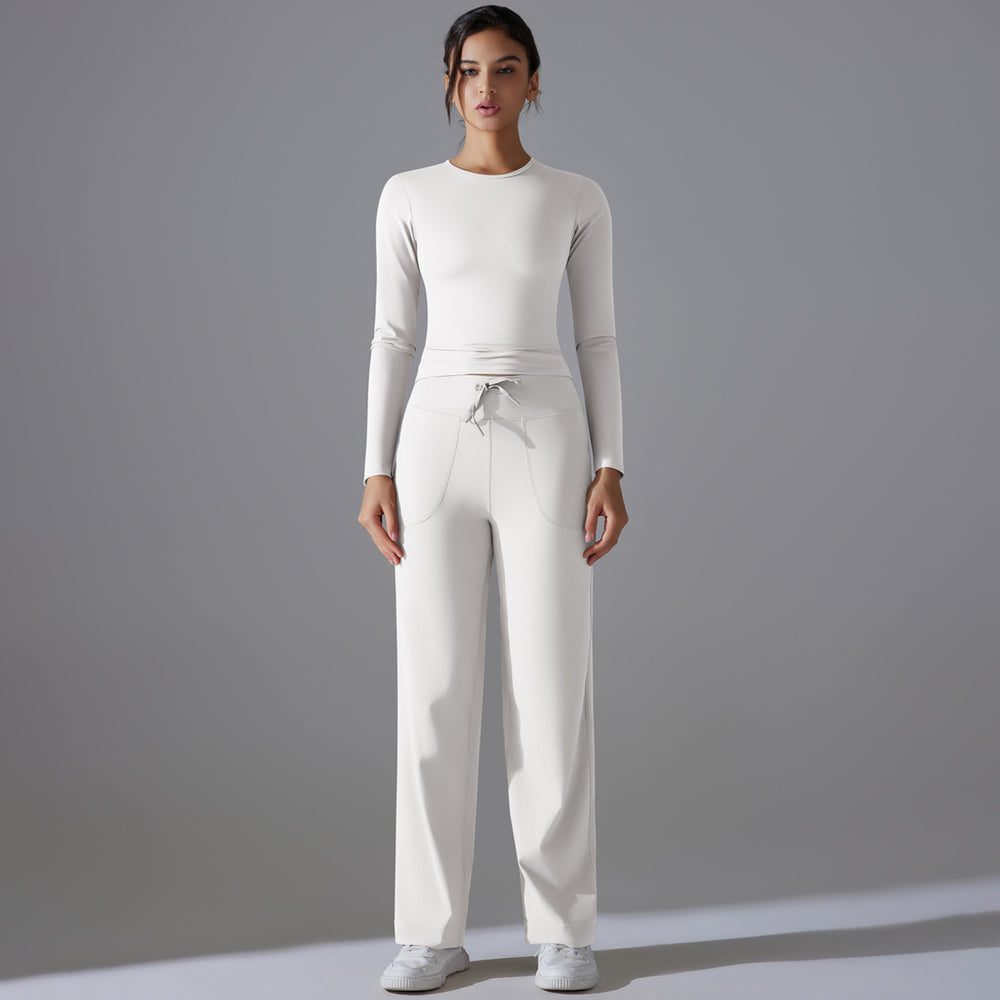 High-waisted, butt-lifting, drawstring wide-leg pants with a barely-there feel, paired with a form-fitting, long-sleeved yoga top. breathable, quick-drying, perfect for outdoor running and fitness