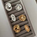 Wholesale hollow flower rings - european and american niche design, irregular spiral faux pearl open finger rings, women's jewelry