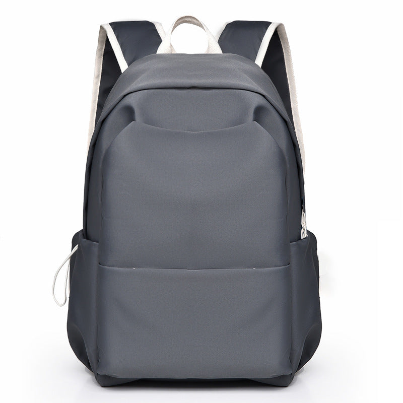 Casual men's and women's same backpack, cute pendant, student backpack, daily leisure large-capacity multi-functional backpack.