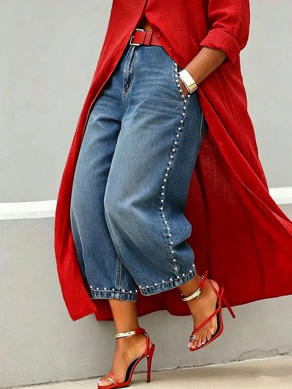 European and american style women's washed denim jeans with beaded side detailing, pearl embellished hem, vintage high-waisted wide leg jeans