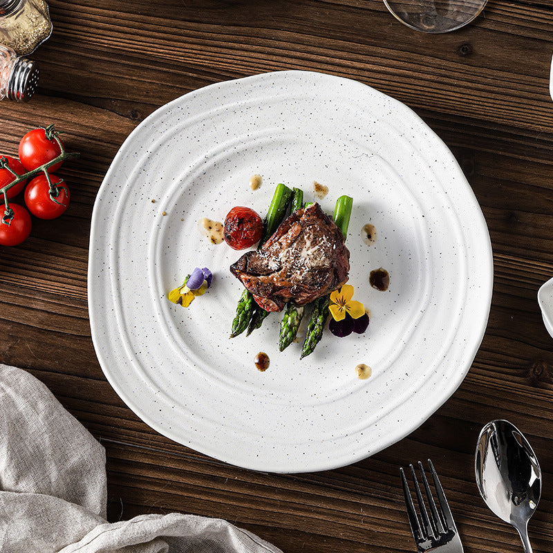 Minimalist blue and white polka dot ceramic bowls, plates, and dishes - perfect for home, restaurant, western cuisine, steak, high-end hotel, and unique dessert presentation