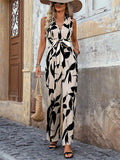e-commerce  spring/summer new arrival: sleeveless printed jumpsuit with a stylish, high-waisted, tie-waist, wide-leg design for women