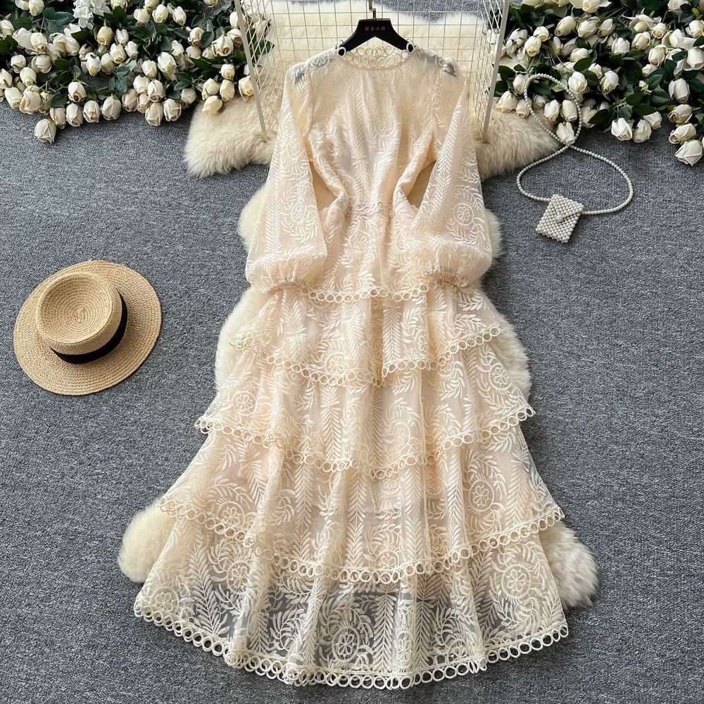 French chic high-end elegant dress for women, autumn  collection: luxurious, heavily embroidered, cinched waist, ruffle hem, tiered maxi dress