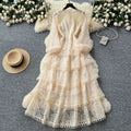 French chic high-end elegant dress for women, autumn  collection: luxurious, heavily embroidered, cinched waist, ruffle hem, tiered maxi dress
