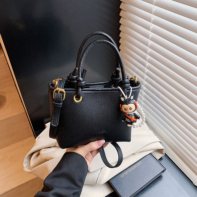 Foreign trade advanced sense hand carrying bucket bag 2025 summer simple and versatile shoulder bag trendy niche design messenger bag