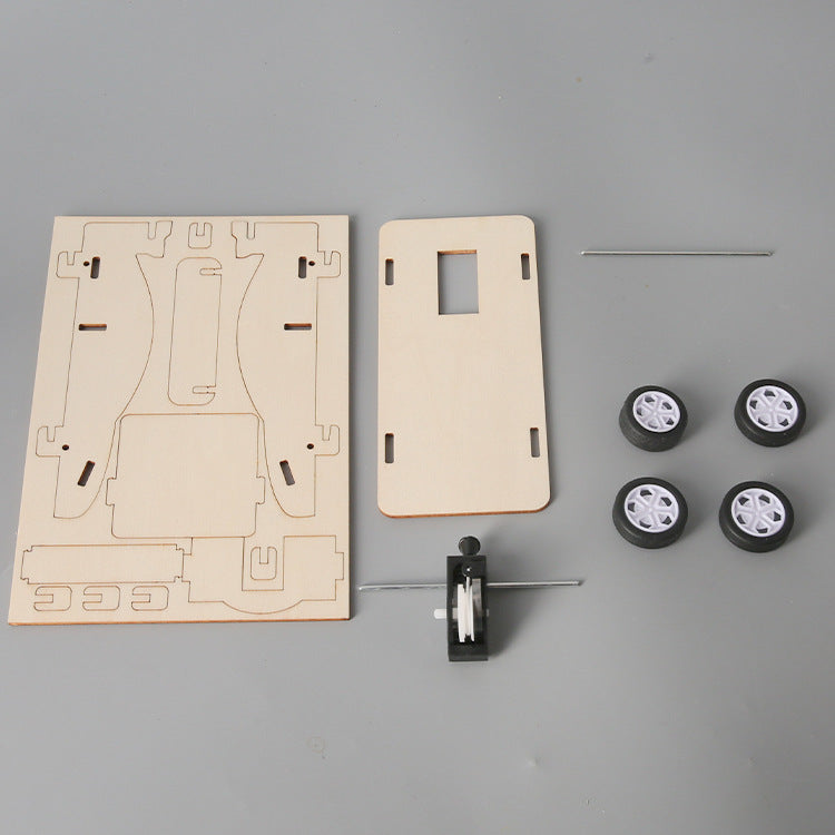 Primary school students DIY technology small production invention clockwork elastic wire trolley scientific experimental materials toy wholesale