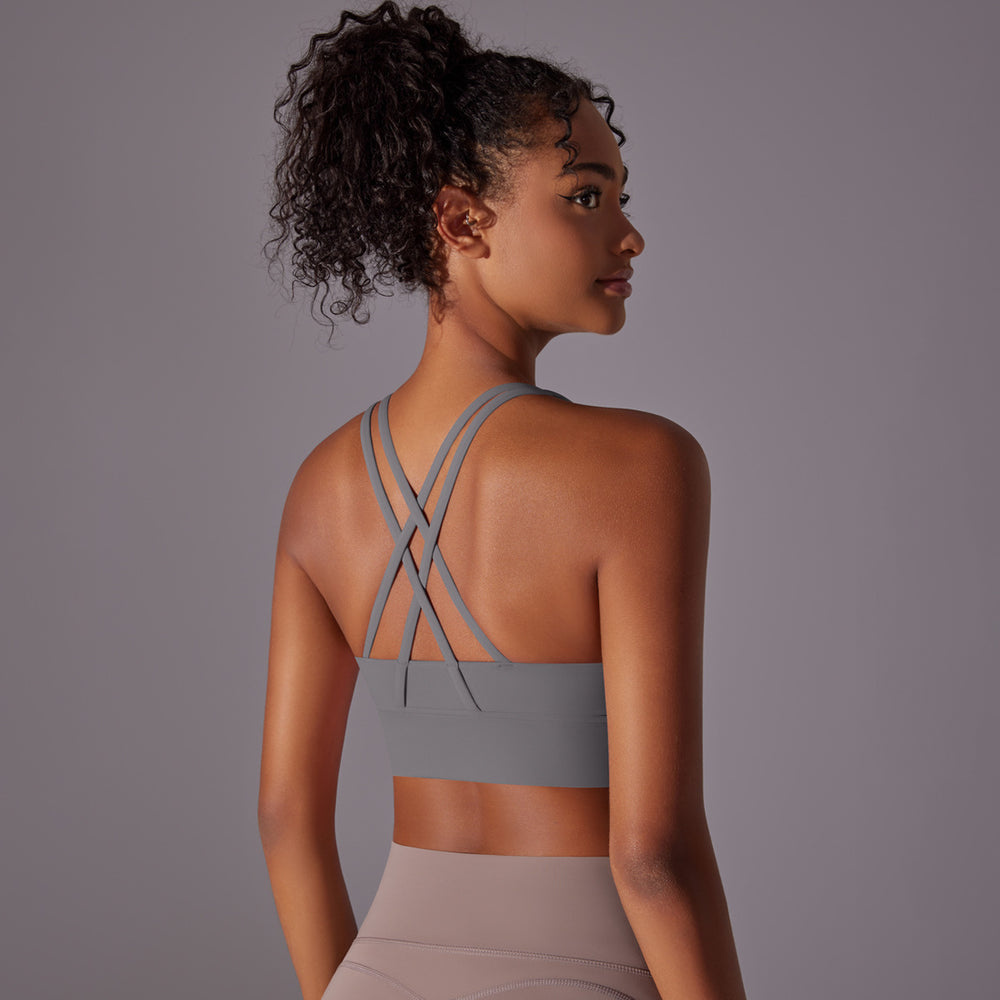 Fashion nude yoga vest women's cross back sports intimates bubble wrap push up seamless one-piece cup fitness bra