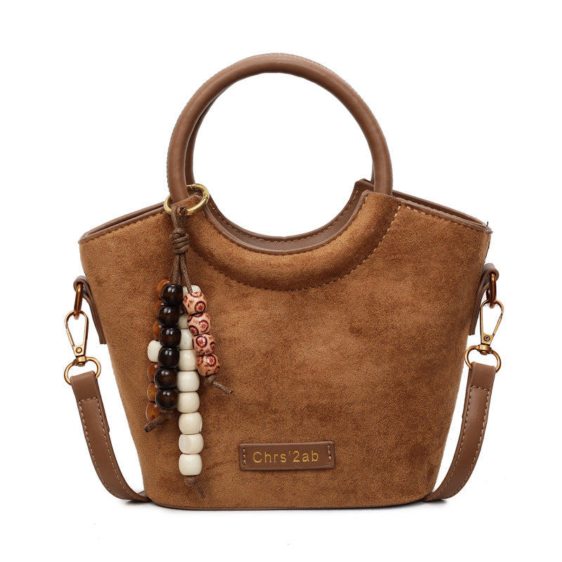 Super hot retro fashion bucket bag 2025 autumn niche design leopard print elegant handbag trendy versatile shoulder bag