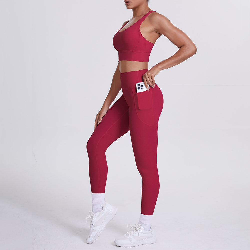 New arrival cross beautiful back cloud sense tight yoga suit suit women's high waist hip pocket sports fitness suit two-piece set
