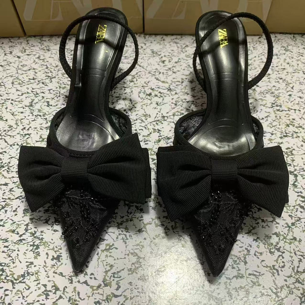 Za's 2025 new women's low-heel pumps: elegant, pointed-toe, ankle-strap flats with black bow detail