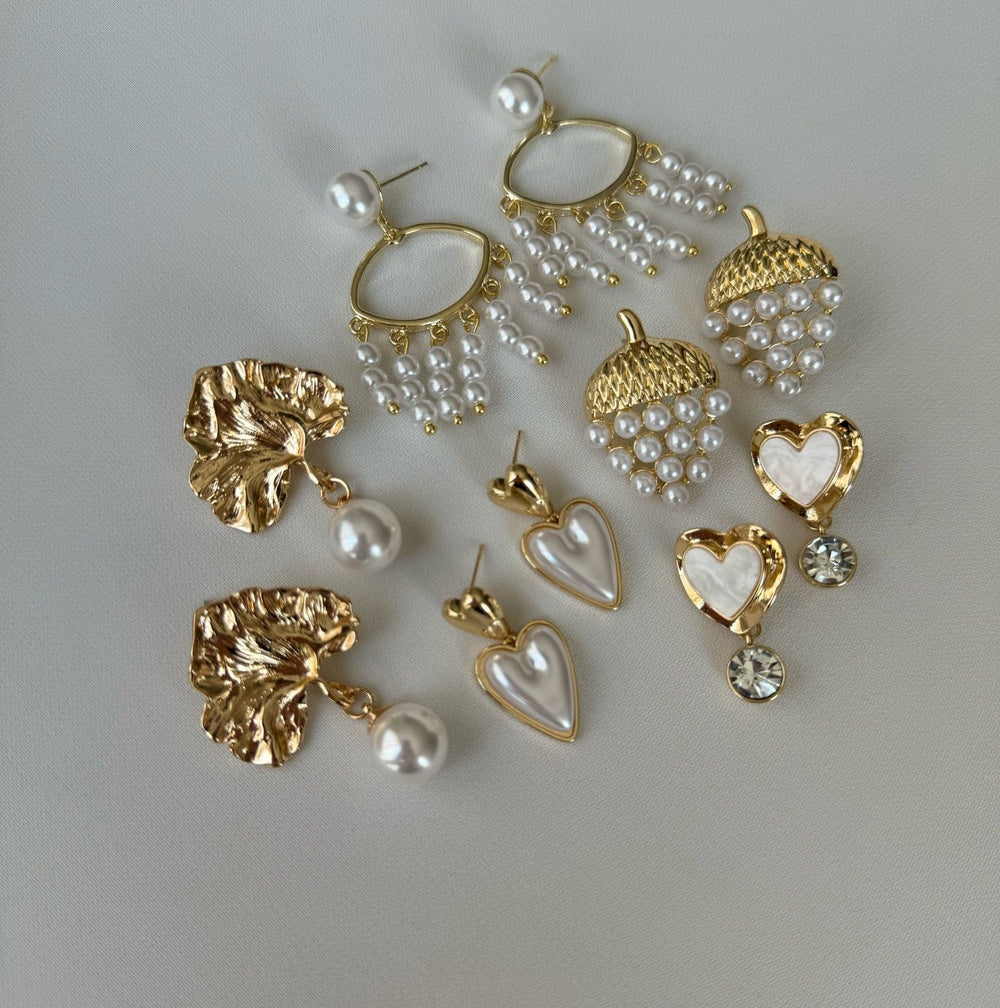 Wholesale pearl stud earrings for women - european and american fashion, statement earrings with a high-end feel, geometric irregular flower and heart earrings for women
