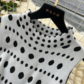 Elegant polka dot sleeveless knit dress - slim fit, figure-flattering, and chic for summer
