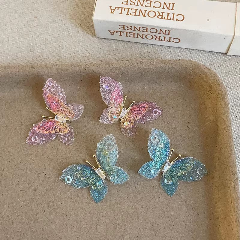 High-end, ethereal gradient 3d butterfly stud earrings for women. unique, niche design, fashionable, elegant, and versatile