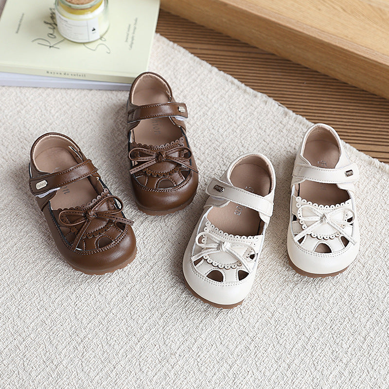 New girls' sandals: summer kids' fashion bow solid color princess shoes, soft sole hollow-out classic leather shoes