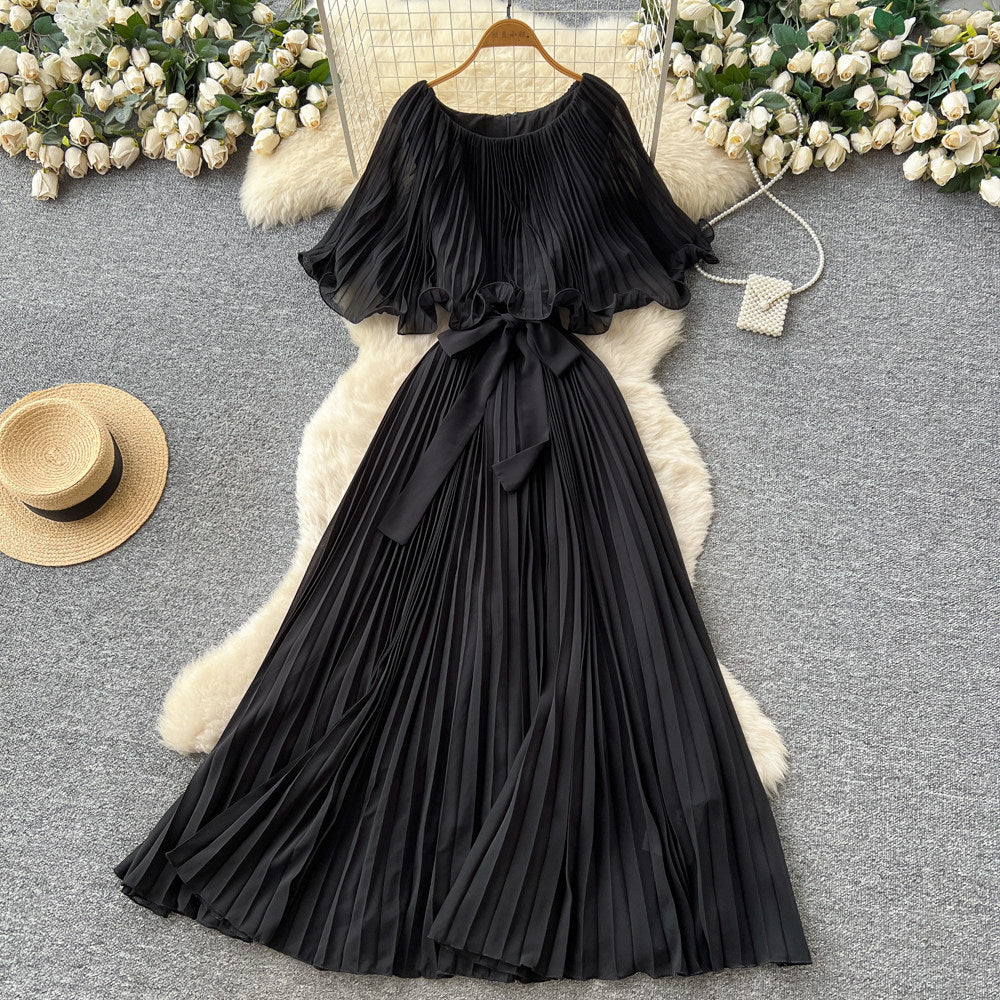 French-inspired pleated dress for women, featuring a bow tie, off-the-shoulder design, tie-waist, and flattering pleats for an elegant and sophisticated look