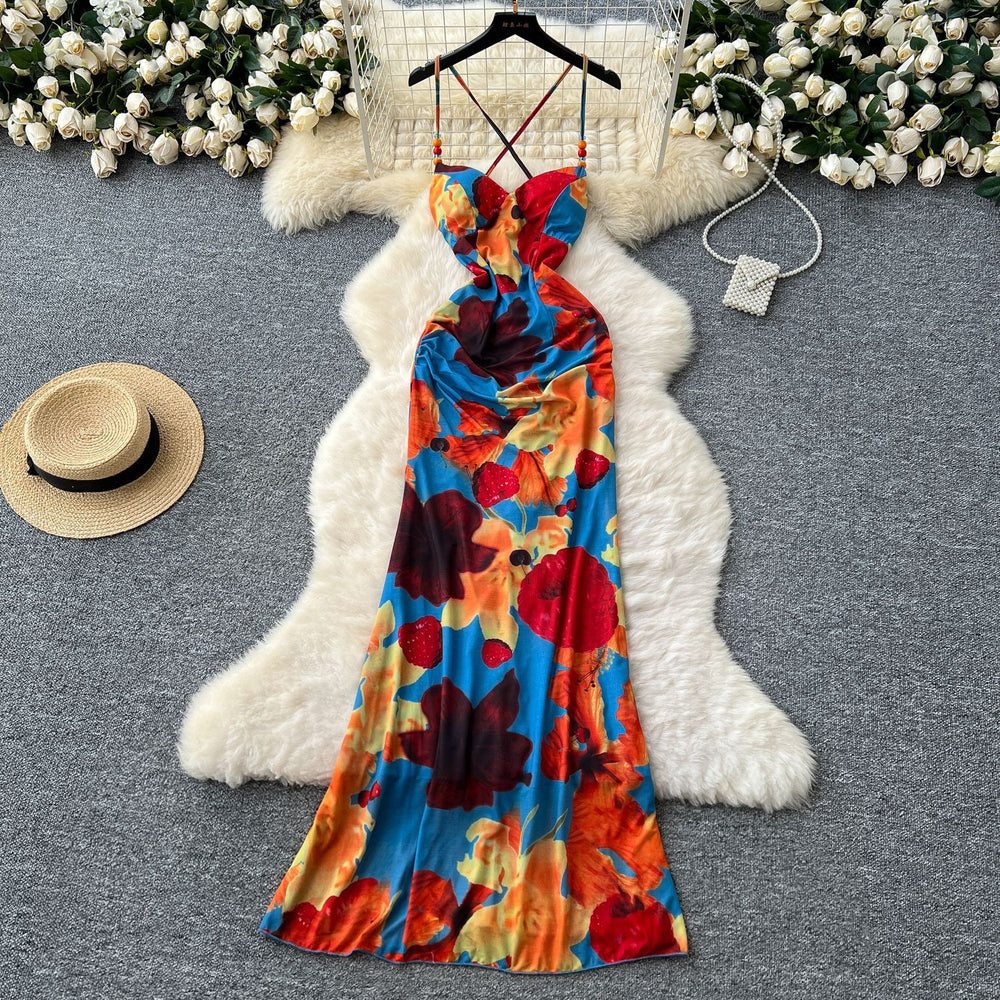 French-inspired, subtly sexy, open-back camisole dress with ruched waist, figure-flattering silhouette, and printed design – perfect for a vacation getaway