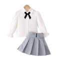 Girls' foreign trade skirt set: white long-sleeve blouse with bow tie, high-waisted pleated skirt, preppy style children's outfit