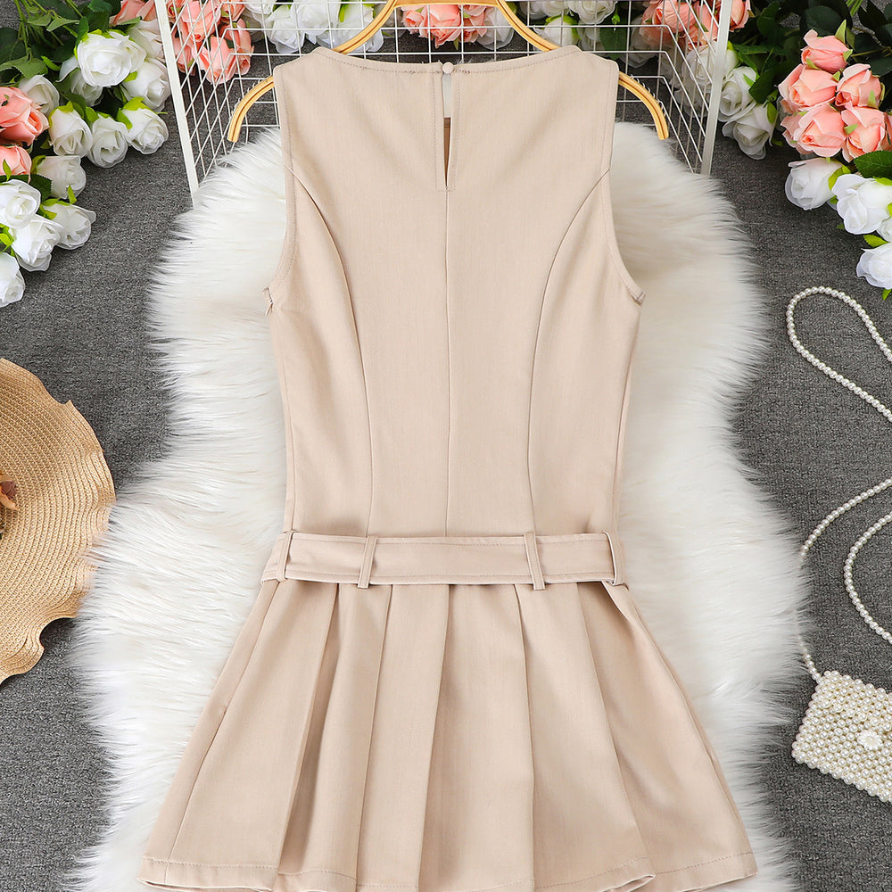 Women's sleeveless pleated mini dress with cinched waist, round neck, and belt – a chic and versatile work-ready style
