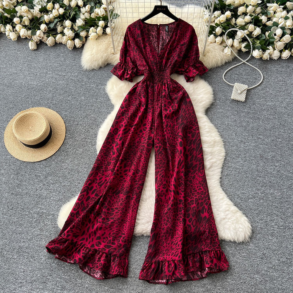 Summer vacation chic: effortless & mature casual v-neck short sleeve jumpsuit with elastic waist, high waist, slimming wide leg, and printed design
