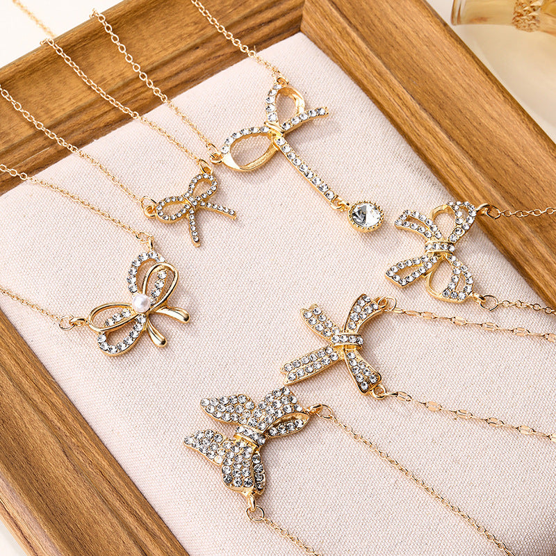 Wholesale rhinestone alloy bow necklace - new cross-border jewelry for women, european and american style pendant, unique high-end clavicle chain