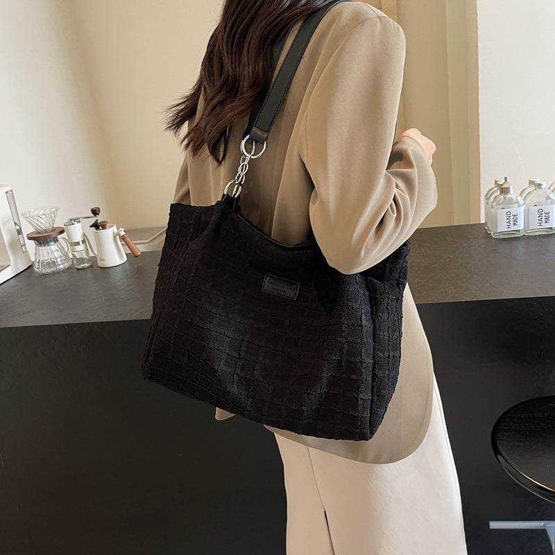 Canvas tote bag women's large capacity 2025 new casual shoulder bag summer versatile senior sense class commuter bag