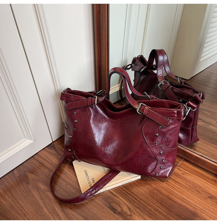 Cross-border retro bag women's large capacity 2025 new summer casual messenger bag rivet portable commuter tote bag