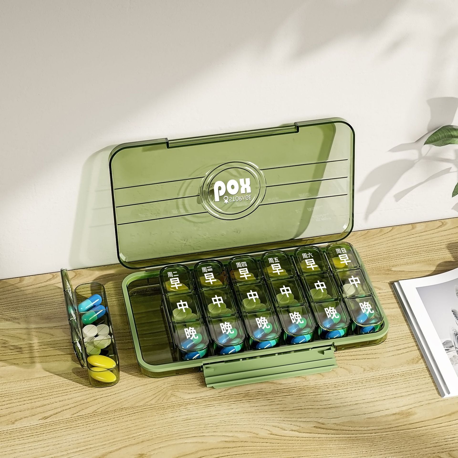 Portable and portable medicine box seven days a week, small medicine dispenser, large character mini medicine reminder box for the elderly