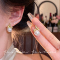Cross bow pearl earrings for women niche styleclassy sense casualeasiest for matchelegant earrings work clothing earrings wholesale