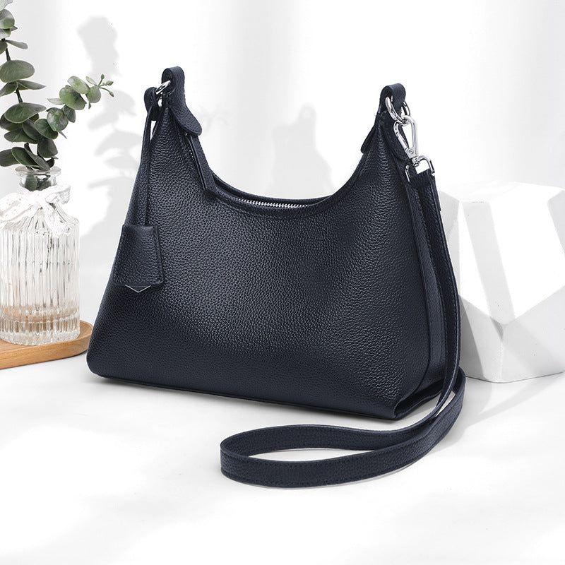 Genuine leather shoulder bag 2025 spring new niche design women's bag temperament advanced simple first layer cowhide messenger bag