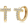 European and american jewelry: ear cuffs, diamond-studded small hoop earrings, stud earrings, and ear bone rings
