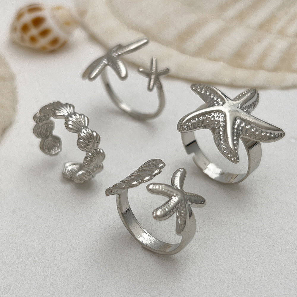 Wholesale seashell ring set - european & american ocean-inspired vacation jewelry for women - adjustable starfish open cuff bracelet