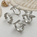 Wholesale seashell ring set - european & american ocean-inspired vacation jewelry for women - adjustable starfish open cuff bracelet
