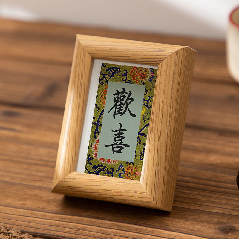 Photo frame table cardboard decorative picture frame wholesale Ping An DIY merchandise ornament Song Jin mini calligraphy frame send painting core