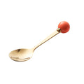 Orange spoon