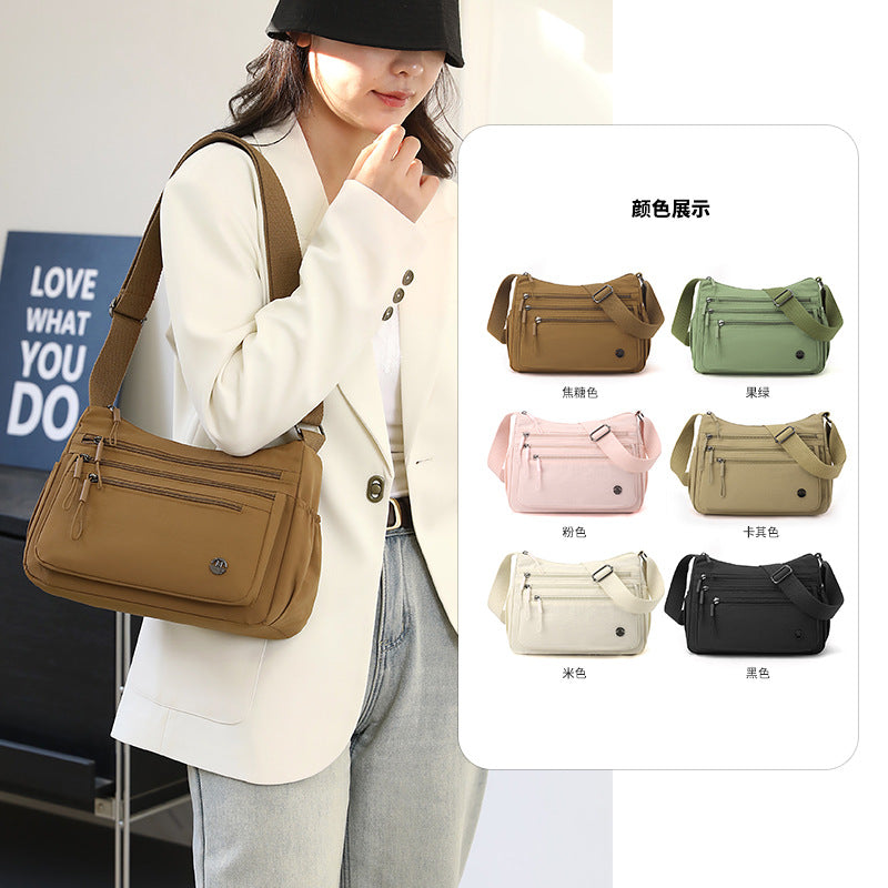 Foreign trade large-capacity casual women's bag 2025 new multi-compartment lightweight shoulder bag fashionable nylon simple messenger bag