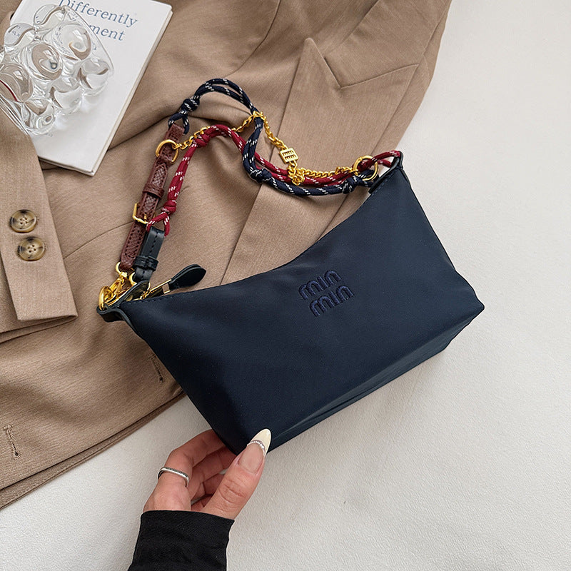 Internet celebrity trend shoulder bag 2025 summer new contrasting color canvas small lunch box bag commuter fashion trend handbag