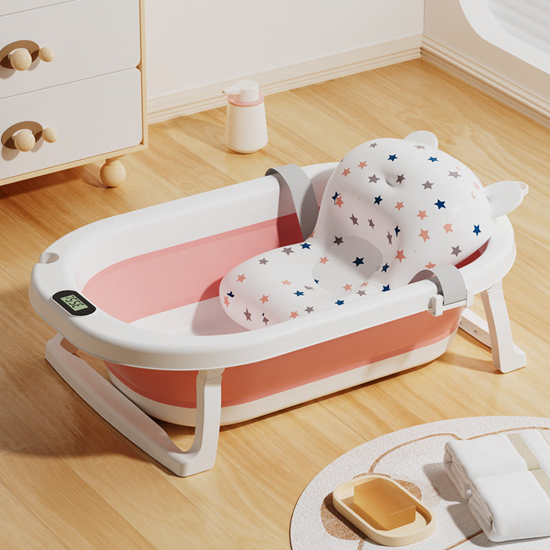 Newborn baby foldable bathtub with temperature-sensitive silicone plug, easy grip handles, and large capacity for baby bathing