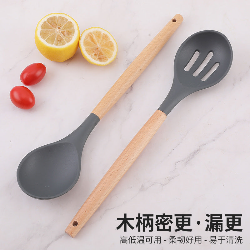Food grade silicone non-stick pan is denser and more leak-resistant to high temperature. Household wooden handle, dense spoon, colander, kitchen cooking tools