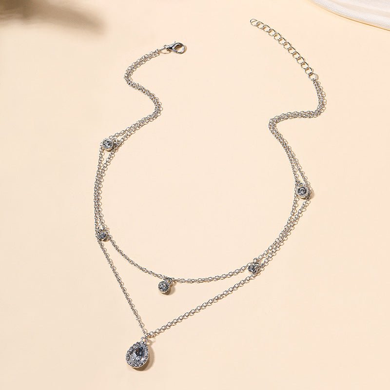 Multi-layer crystal necklace wholesale fashion cross-border stacking jewelry new arrival gold-plated water drop socialite long sweater chain for women
