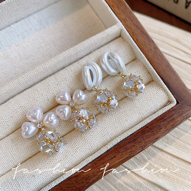 High-end zircon flower earrings for women, 2026 new popular earrings, unique design, accessible luxuryelegant whitening earrings