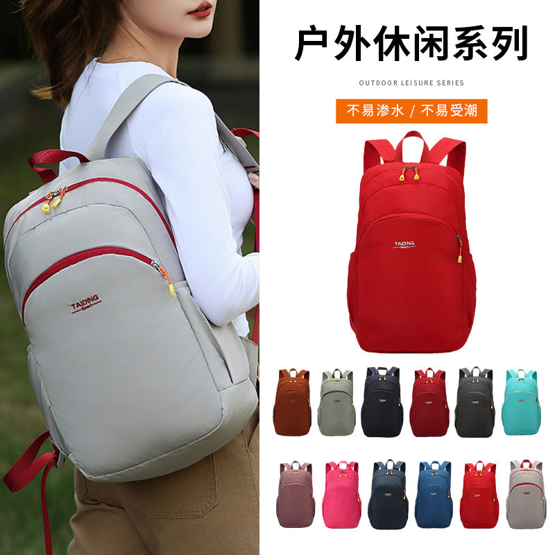 New foldable storage backpack women's travel bag simple casual nylon lightweight outdoor backpack schoolbag