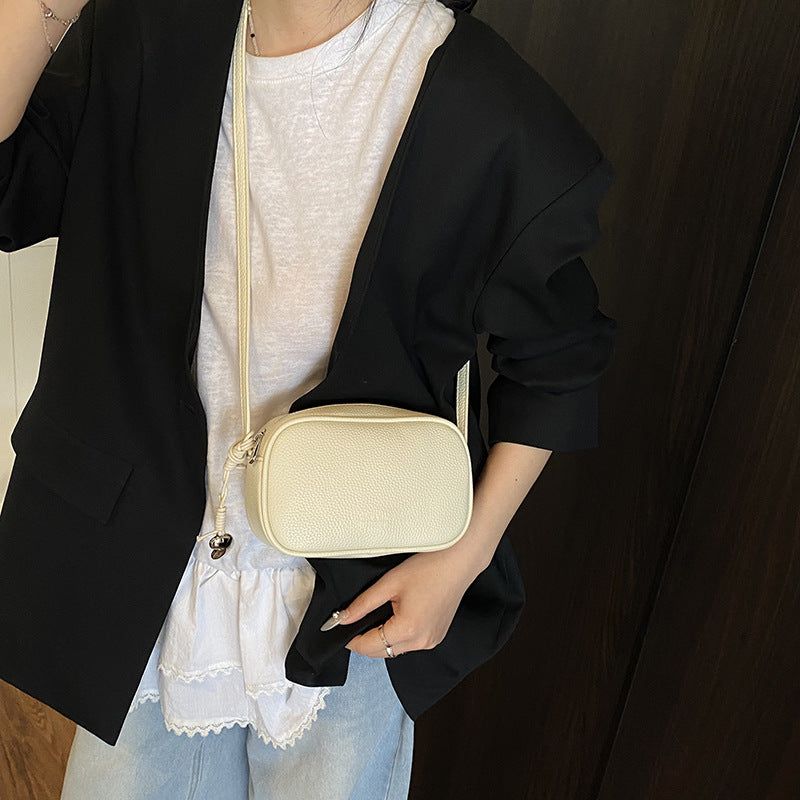 Cross-border high-end fashion foreign-style pillow bag women's 2025 new lychee pattern simple solid color shoulder messenger bag